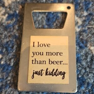 Silver Bottle Opener with Humorous Message